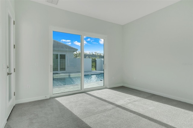 empty room featuring carpet flooring