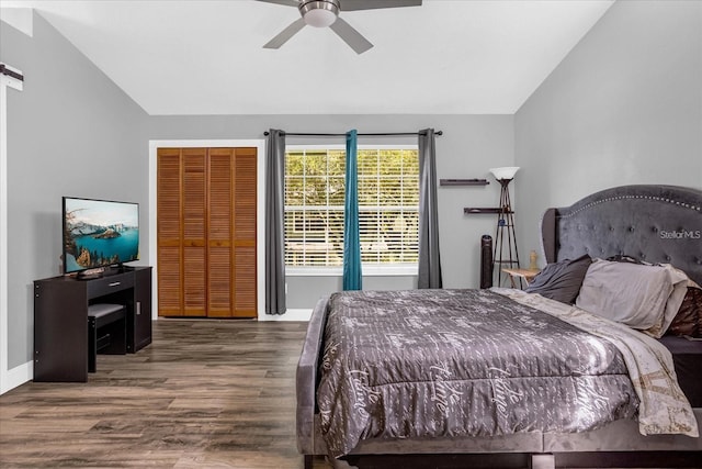 bedroom featuring ceiling fan, lofted ceiling, and dark wood-type flooring