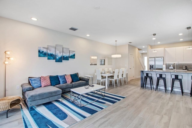 living room featuring light hardwood / wood-style flooring