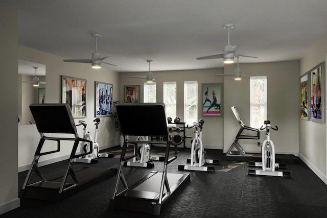 exercise room with ceiling fan