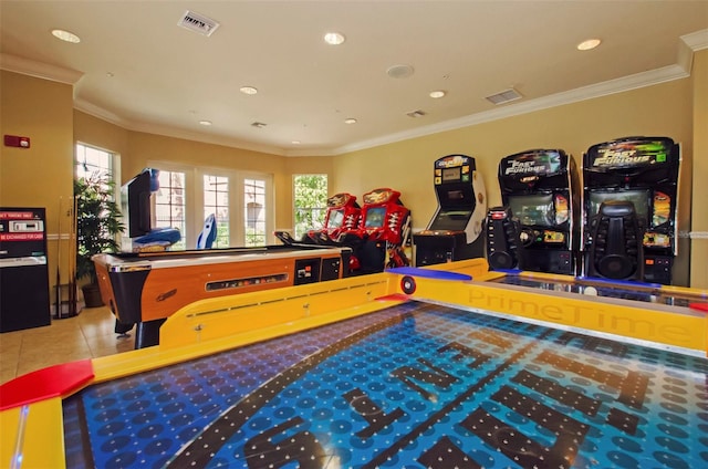 game room with light tile patterned floors and ornamental molding