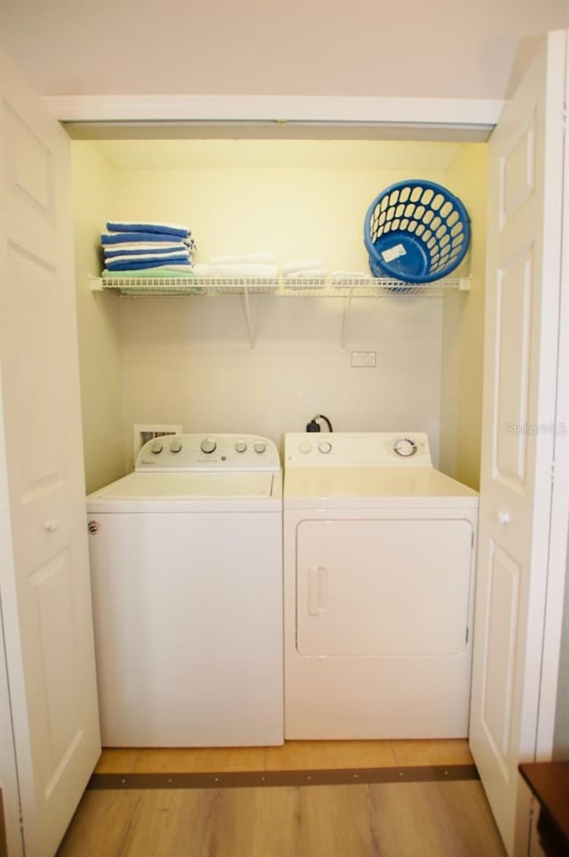 washroom featuring separate washer and dryer