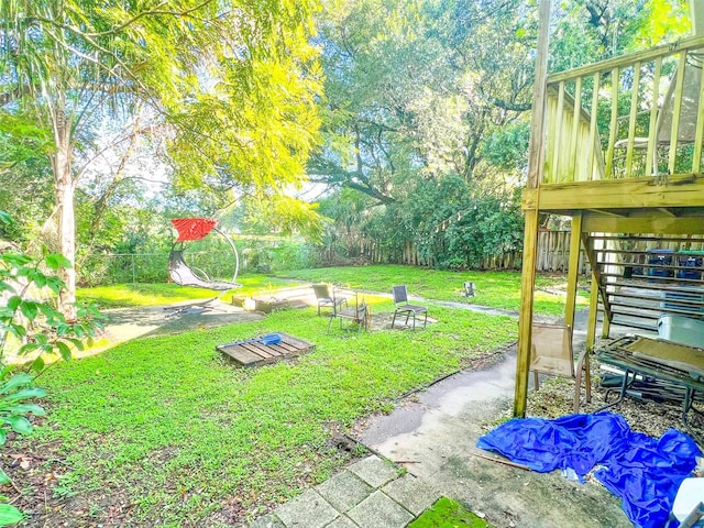 view of yard featuring a deck