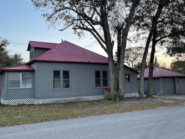 view of property exterior at dusk