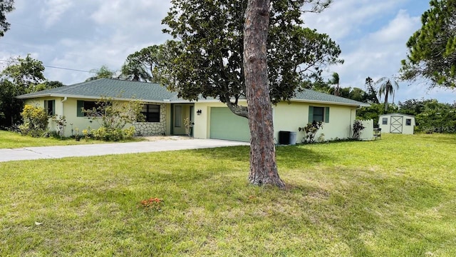 ranch-style house with a garage and a front yard