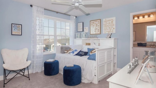 carpeted bedroom with ceiling fan