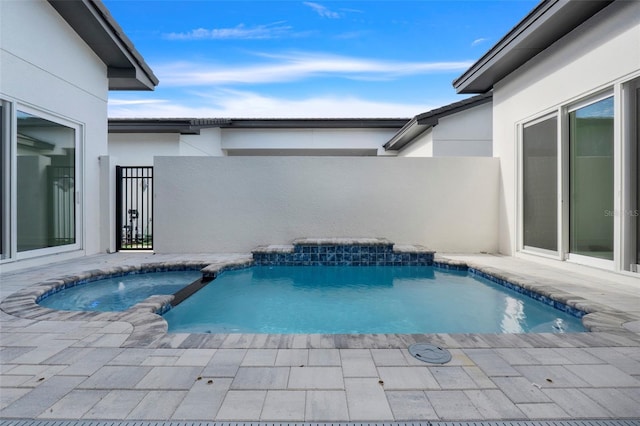 view of pool featuring a patio area