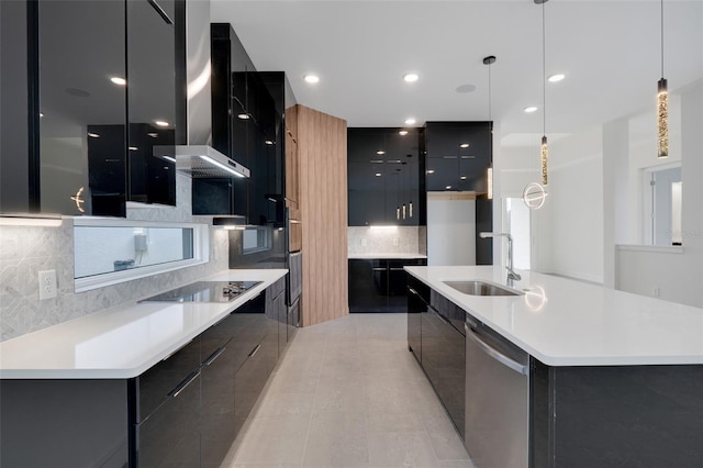 kitchen with hanging light fixtures, a large island, stainless steel dishwasher, wall chimney range hood, and black electric cooktop