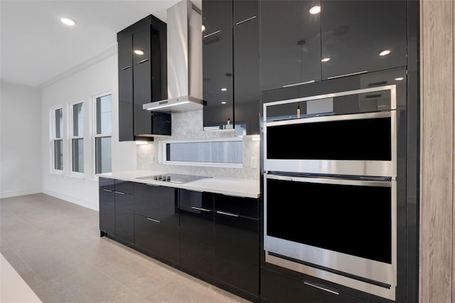 kitchen with backsplash, stainless steel double oven, black electric cooktop, and wall chimney range hood