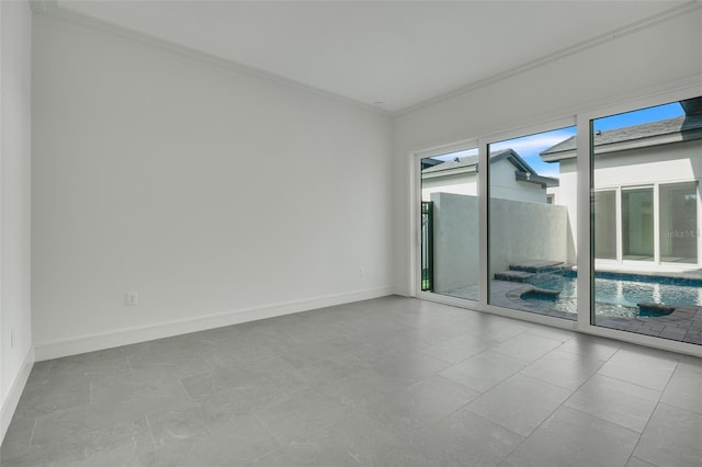 spare room with ornamental molding