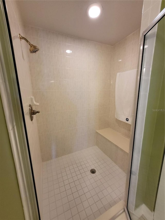 bathroom with an enclosed shower