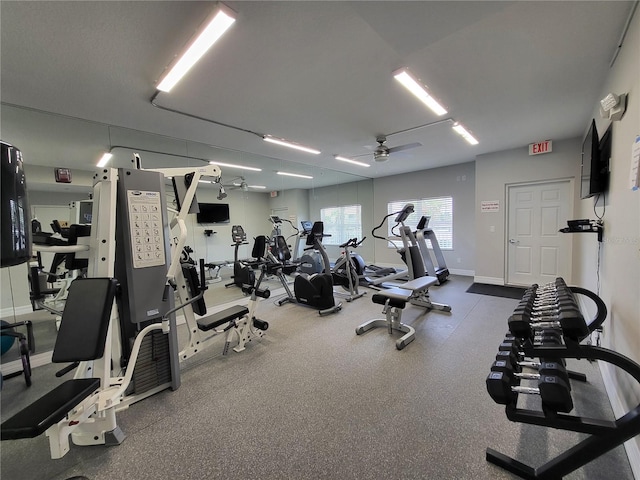 workout area with ceiling fan