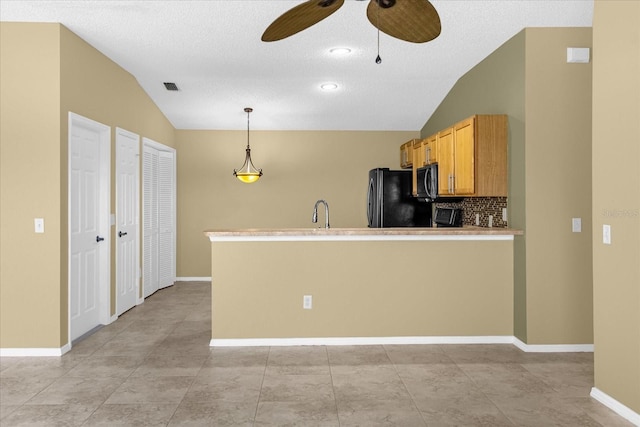 kitchen with lofted ceiling, tasteful backsplash, ceiling fan, and light tile flooring