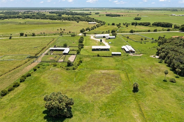 birds eye view of property featuring a rural view