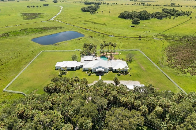 aerial view with a rural view and a water view