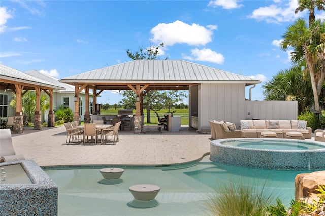 view of swimming pool featuring a gazebo, an in ground hot tub, a patio area, and an outdoor hangout area