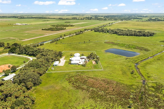 aerial view with a rural view and a water view