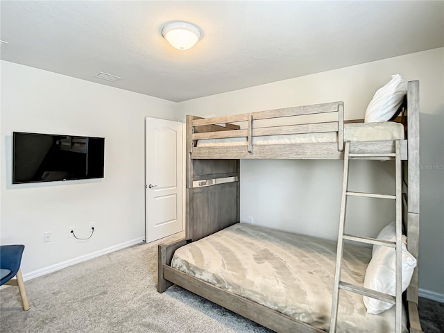 unfurnished bedroom featuring light carpet