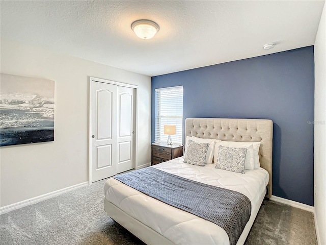 carpeted bedroom with a closet