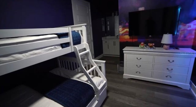 bedroom featuring dark hardwood / wood-style floors