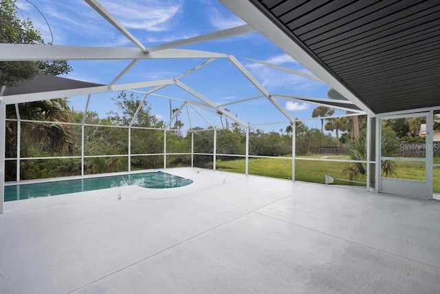 view of swimming pool featuring a patio area, a lanai, and a yard