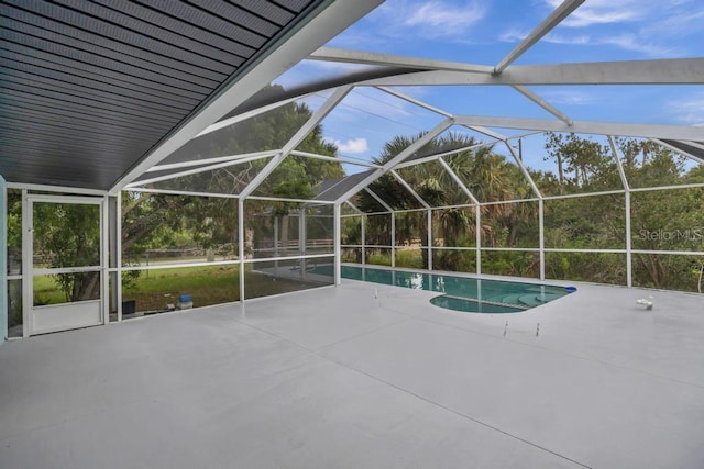 view of pool featuring a lanai and a patio area