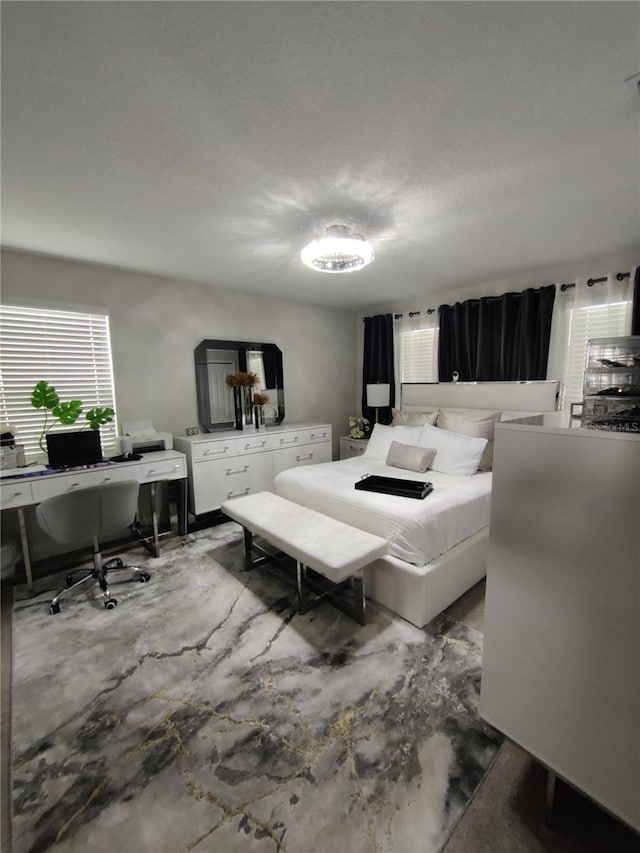 bedroom with concrete flooring