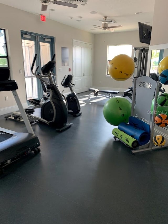 workout area with ceiling fan