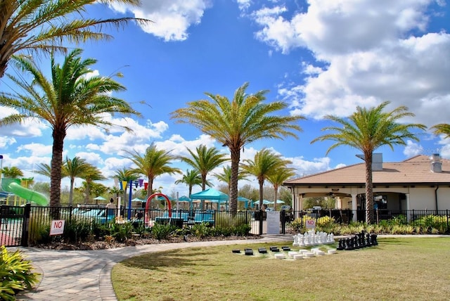 view of home's community featuring a lawn