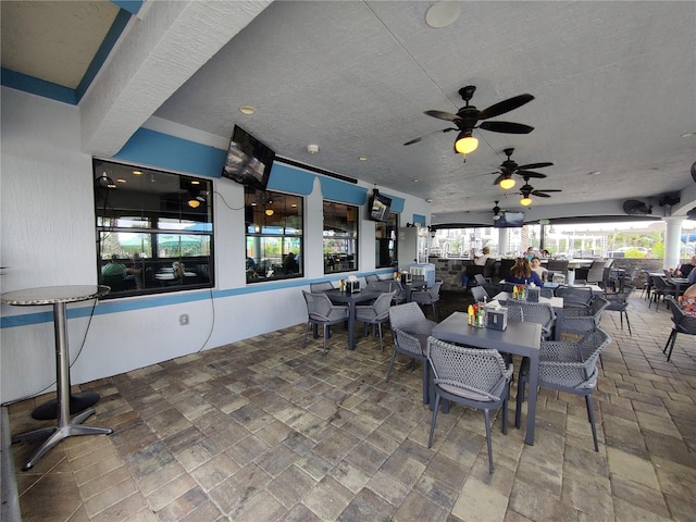 view of patio with ceiling fan