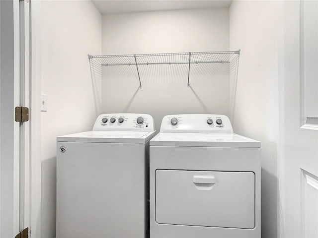 laundry area with washer and dryer