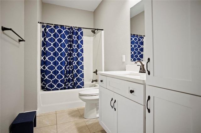 full bathroom featuring tile patterned flooring, shower / bath combo, vanity, and toilet