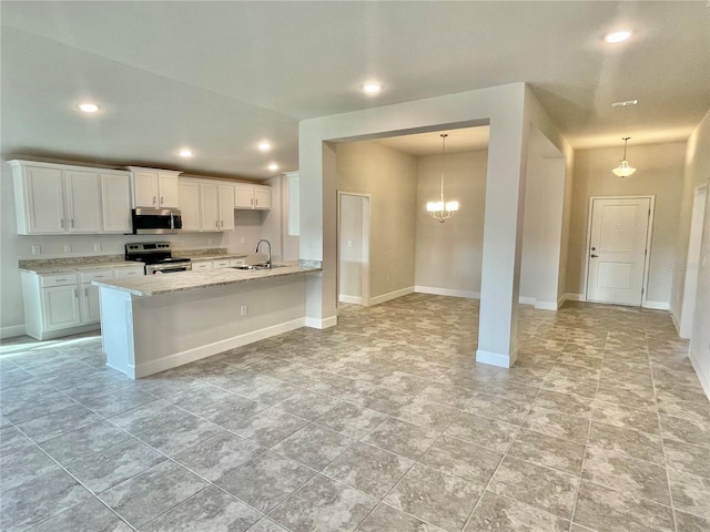 kitchen with white cabinetry, hanging light fixtures, sink, stainless steel appliances, and light stone counters