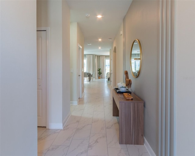 hallway with light tile flooring