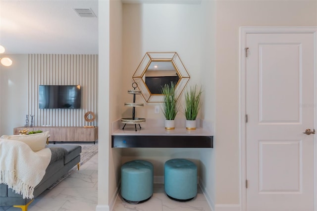 interior details featuring light tile flooring