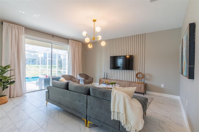 tiled living room featuring a chandelier