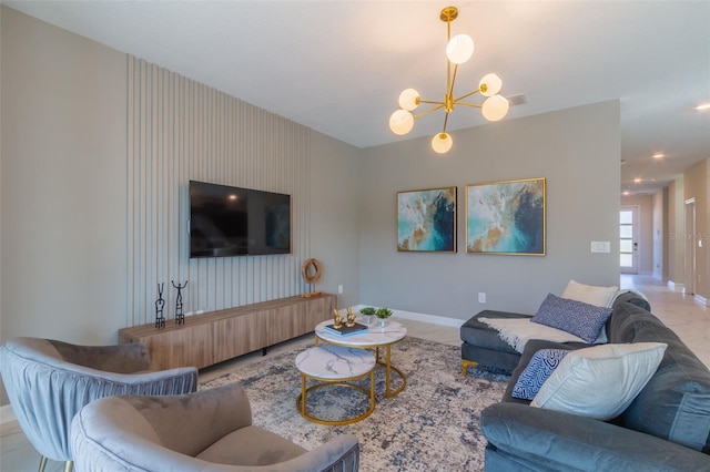 living room with light tile floors and an inviting chandelier