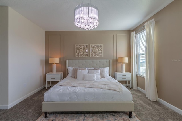 carpeted bedroom with an inviting chandelier