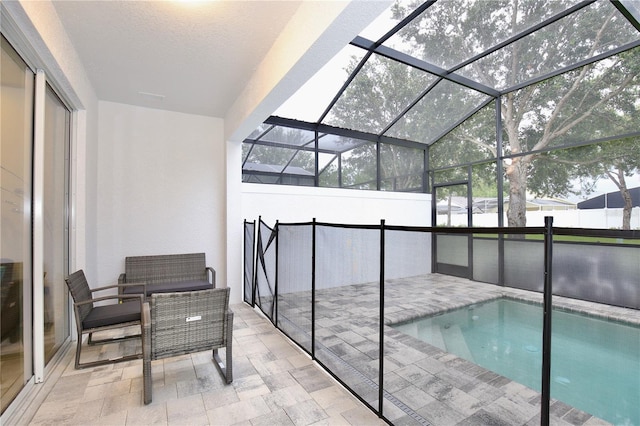 sunroom / solarium with a pool