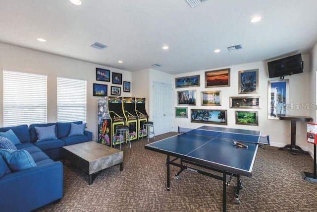 playroom with dark colored carpet