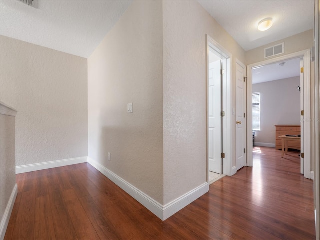 hall featuring dark hardwood / wood-style flooring