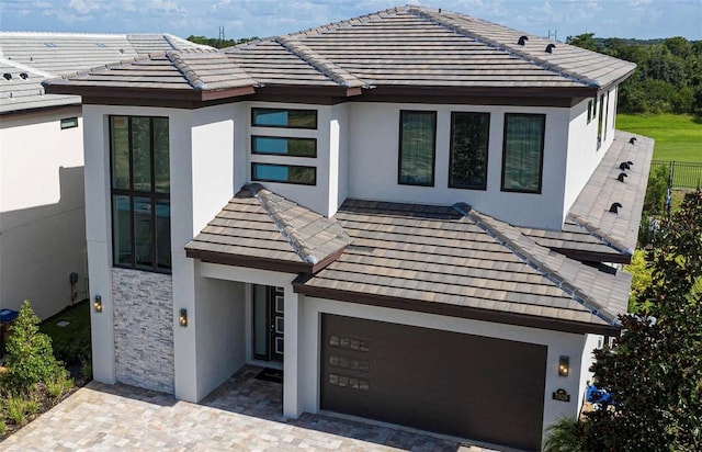 view of front of property featuring a garage