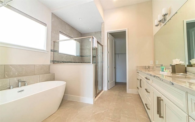 bathroom with shower with separate bathtub, tile floors, and dual vanity