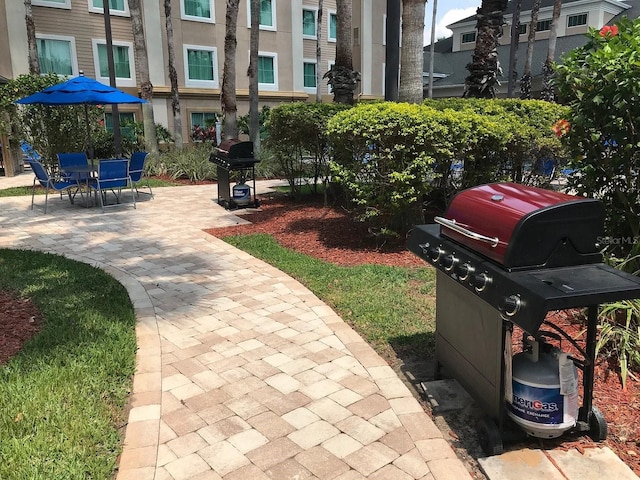 surrounding community featuring a patio area