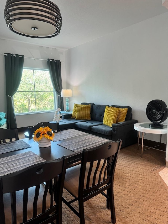 view of carpeted dining space