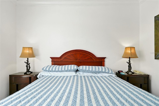 bedroom featuring ornamental molding