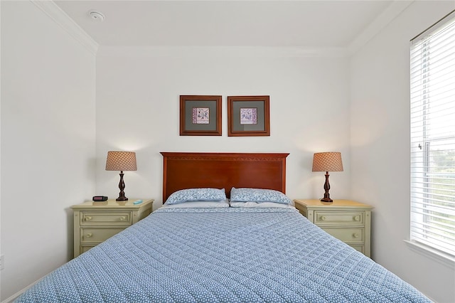 bedroom featuring ornamental molding