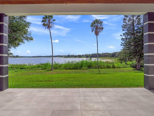 view of patio featuring a water view