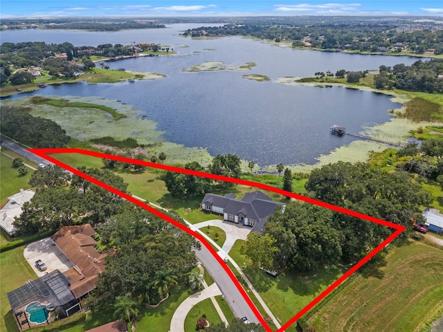 birds eye view of property featuring a water view