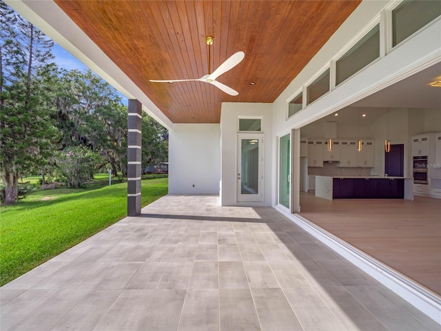 view of patio / terrace featuring a ceiling fan